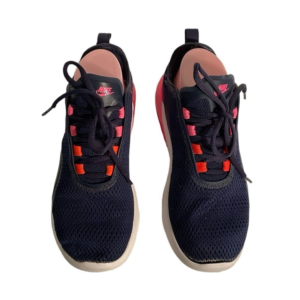 Nike Air Max Motion 2 women’s running shoe. Pink, white and Navy shoes. Size 7